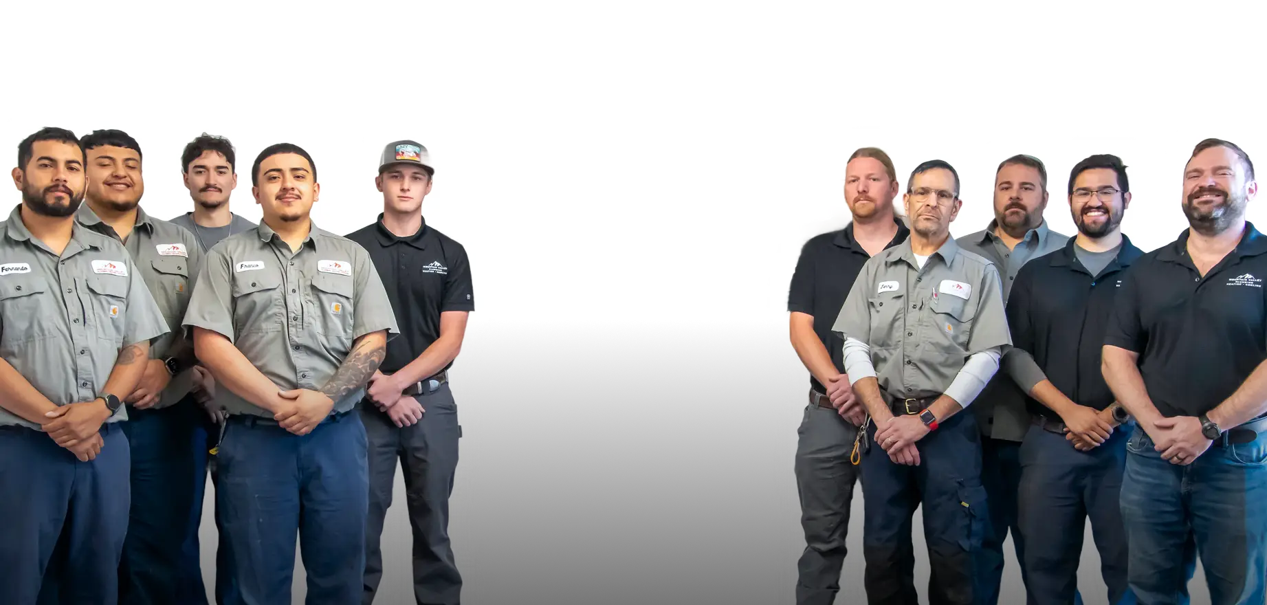 Mountain Valley Plumbing, Heating, and Cooling team members in uniform posing against a transparent background.